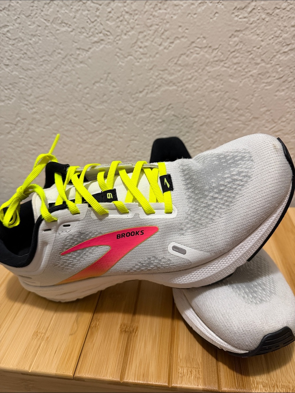 Brooks Women’s White Running Shoes with Neon Yellow Laces and Pink Accent